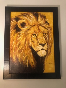 Tanzanian painting of a lion profile. Symbolic of a Defender.